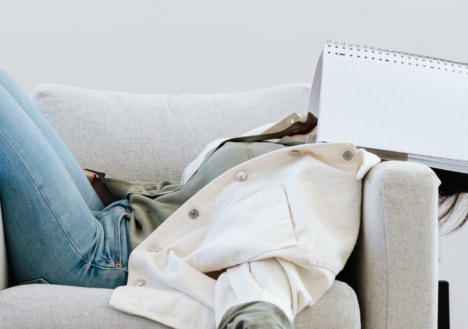 exhausted woman on the couch