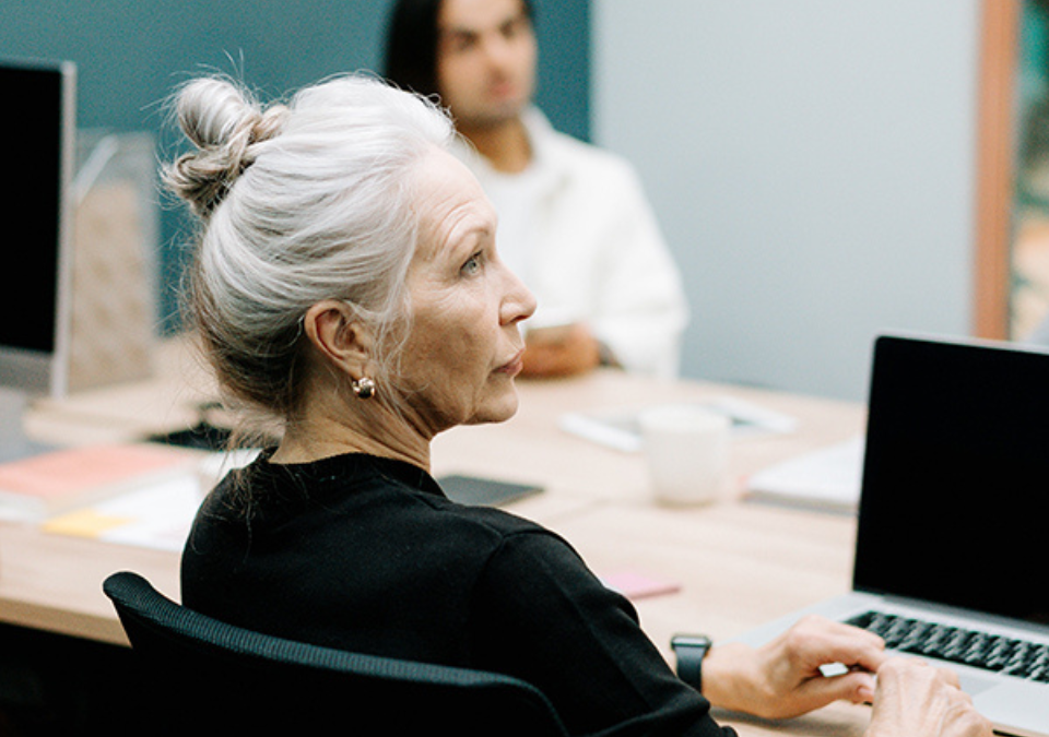 older women at a board meeting